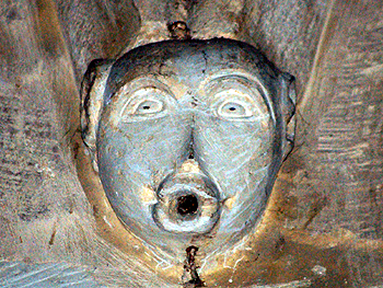 Grotesque head on the north arcade June 2012